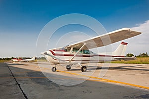 Small airplane with propeller in front.