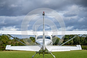 Small airplane ready to take off on the airfield