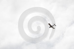 small airplane in sky