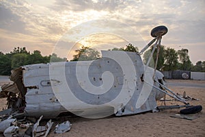 Small airplane wreckage in the deserted area of Dubai city