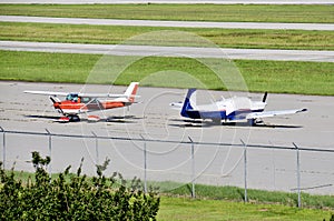 Small Airplanes on a runway