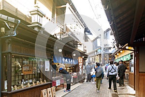 Small alley with souvenir shops and stores in the hot spring village of Arima Onsen in Kobe, Japan