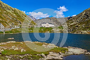 Small alpine lake in the mountains on the border between Italy and Switzerland