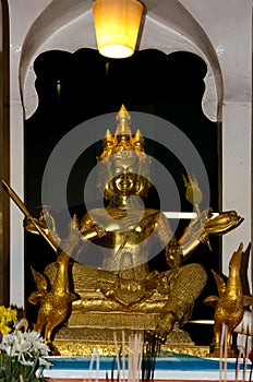 Small altar of worship to Phra Phrom at Bangkok, Thailand