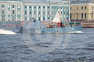 A small amphibious boat D-67 the Serna project is transported by the boat of Peter the Great