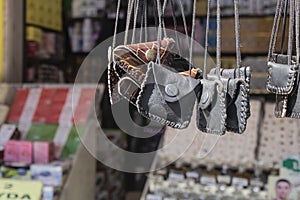 Small amulet bags hang around his neck. Put prayer in it. It is believed to bring good luck