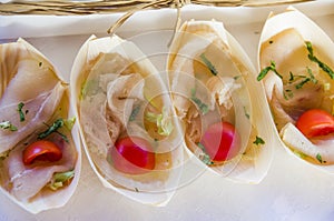 Small appetizers with swordfish and cherry tomatoes