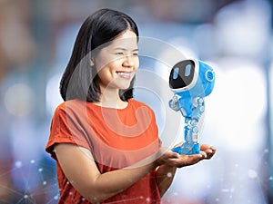 Small artificial intelligence robot assistant in human hand