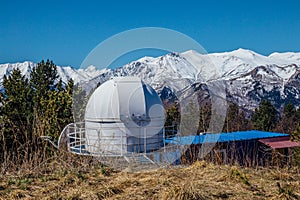 Small astronomical observatory with telescope in Caucasian mountains