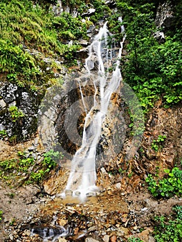 Small ayder waterfall in Rize city with lond exposure shot silky water view photo