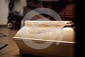 photo of a small baby casket in a funeral photo