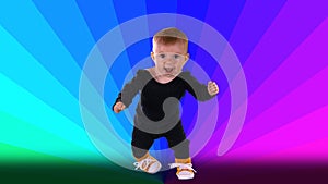 Small baby girl dancing at a disco