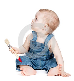 Small baby worker with paint brush