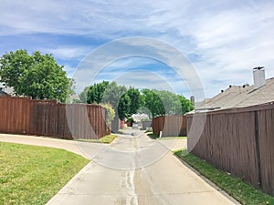 Small back alley at suburban neighborhood in North Dallas, Texa