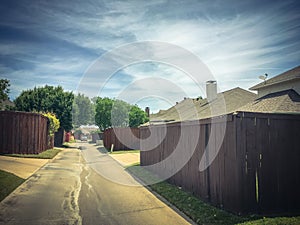 Small back alley at suburban neighborhood in North Dallas, Texa