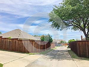 Small back alley at suburban neighborhood in North Dallas, Texa