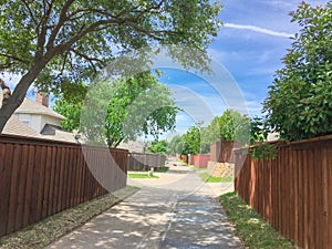 Small back alley at suburban neighborhood in North Dallas, Texa