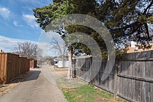 Small back alley at suburban neighborhood in North Dallas, Texa