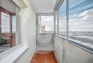 Small balcony interior in modern apartment building