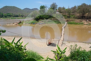 Small bamboo bridge across Mekong river in Luang Prabang, Laos