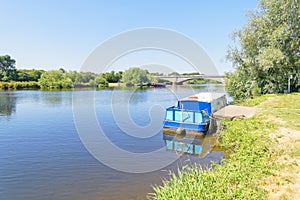 Small barge moored on the River Trent in Gunthorpe, Nottinghamshire