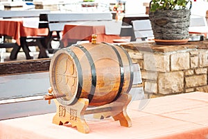 Small barrel of wine on table