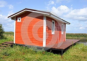 Small bathhouse on the banks of the Volkhov River, Russia