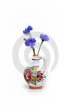 Small beautiful bouquet of cornflowers isolated on a white background