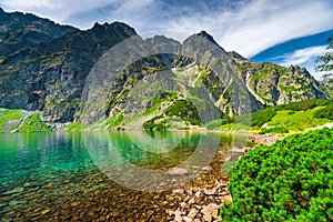 A small beautiful mountain lake Czarny Staw in the high Tatras o