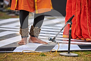 Small bells Ghungroo on male feet of indian dancer for ancient ethnic Kathak dance