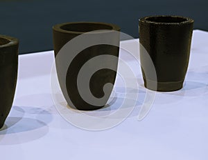 the small black ceramic crucible for transfer molten metal into mold