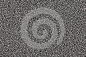 Small black coal balls background