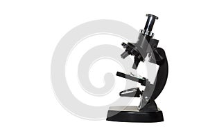 Small black microscope isolated on white background