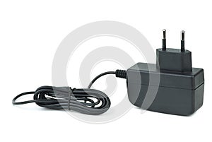 Small black power supply adapter