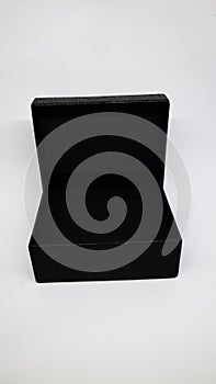 small black square with snake or crocodile skin texture artificial for gift box on white background