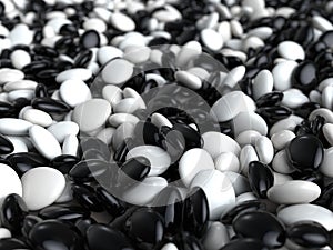 Small black and white stones and rocks - closeup shot with shallow depth of field - background