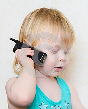 Small blond boy cell phone