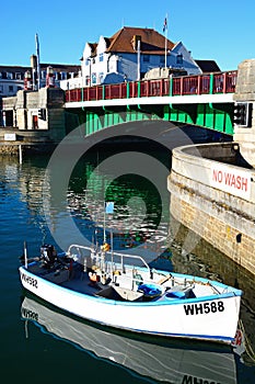 Small boat by the bridge, Weymouth.