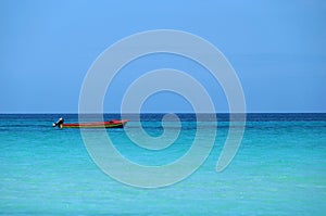 Small boat in carribean sea.