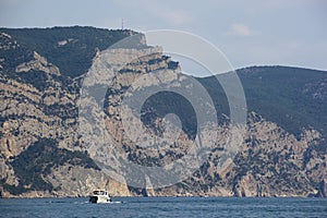 Small boat with Cimean hills near Balaklava Bay, Crimea