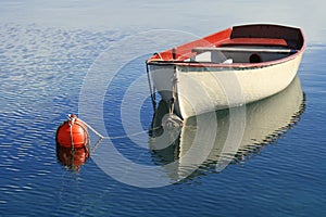 Small boat on the crystal blue sea of Losinj Croatia