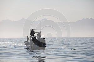 Small Boat and Film Crew in False Bay, South Africa