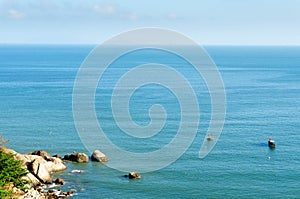 Small boat fishing on the sea, Son tra peninsula, Da nang, Viet nam photo