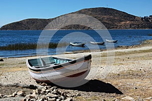 Small boat on lake titicaca