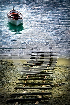 Small boat moated near the shore