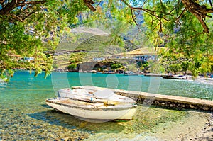 Small boat moored in port, Greece