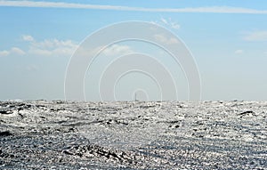 Small boat in the ocean.