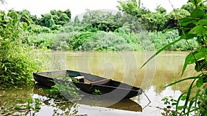 Small boat in Pasak River