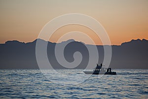 Small Boat and Sunrise in False Bay, South Africa