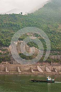 Small boat on Yangtze river in Qutang Gorge, Baidicheng, China